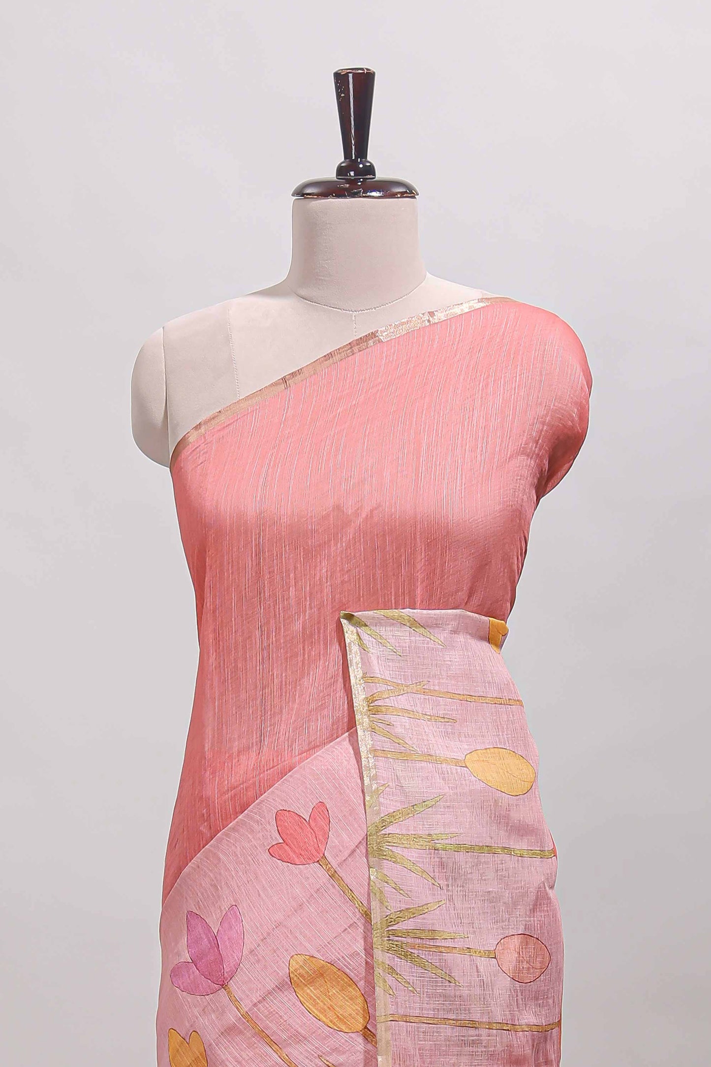 Pink floral design linen cotton saree with self zari border and matching blouse