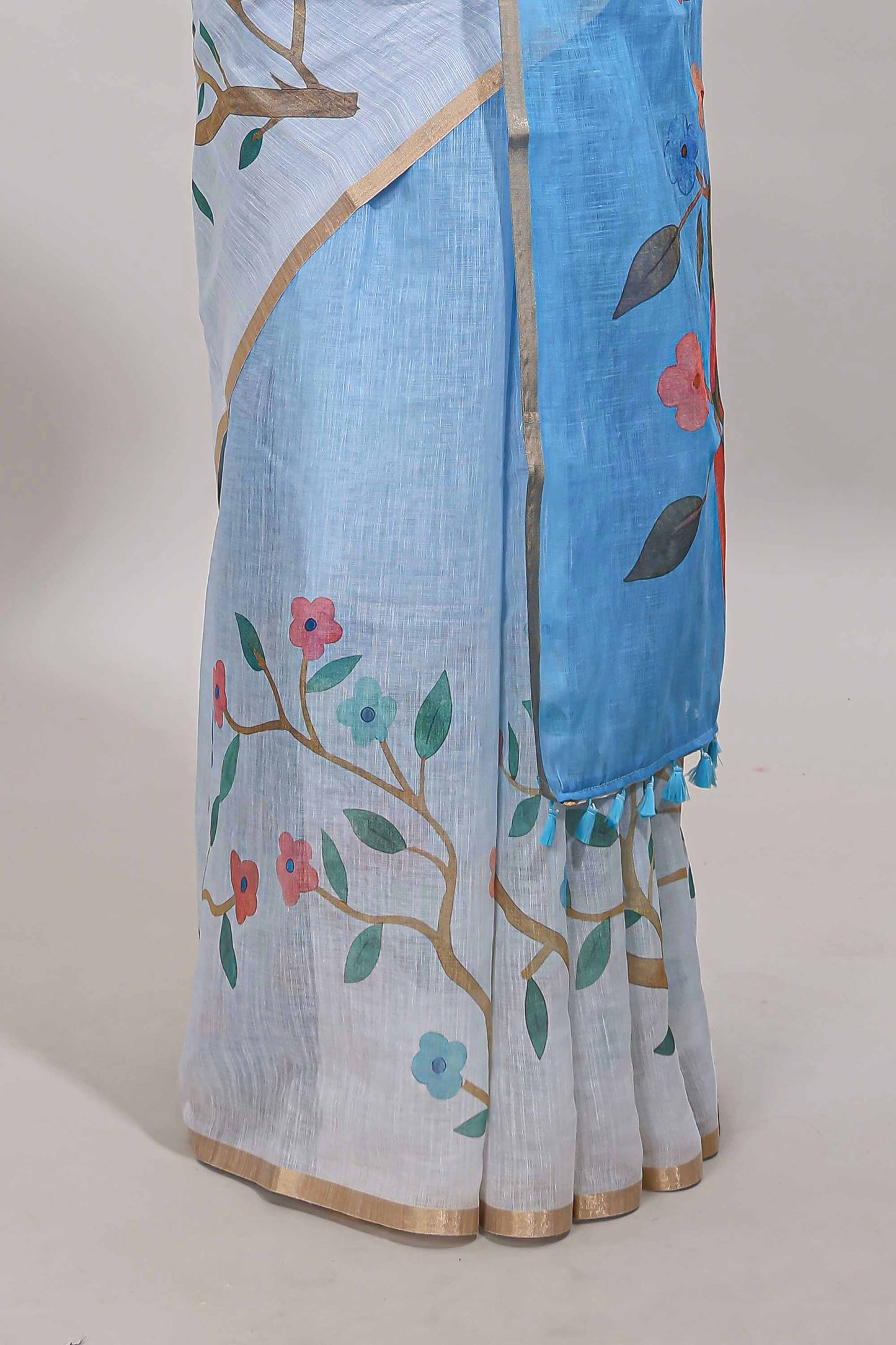 Blue floral vines linen cotton saree with self zari border and matching blouse