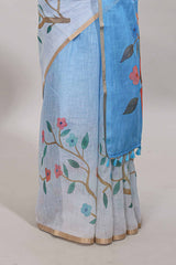Blue floral vines linen cotton saree with self zari border and matching blouse