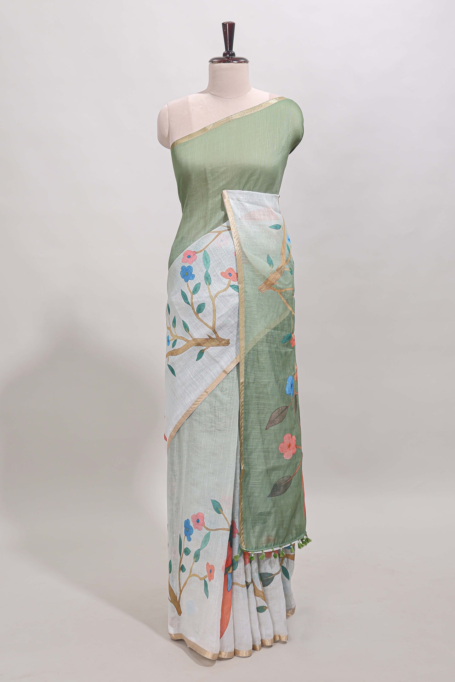 Green floral vines linen cotton saree with self zari border and matching blouse