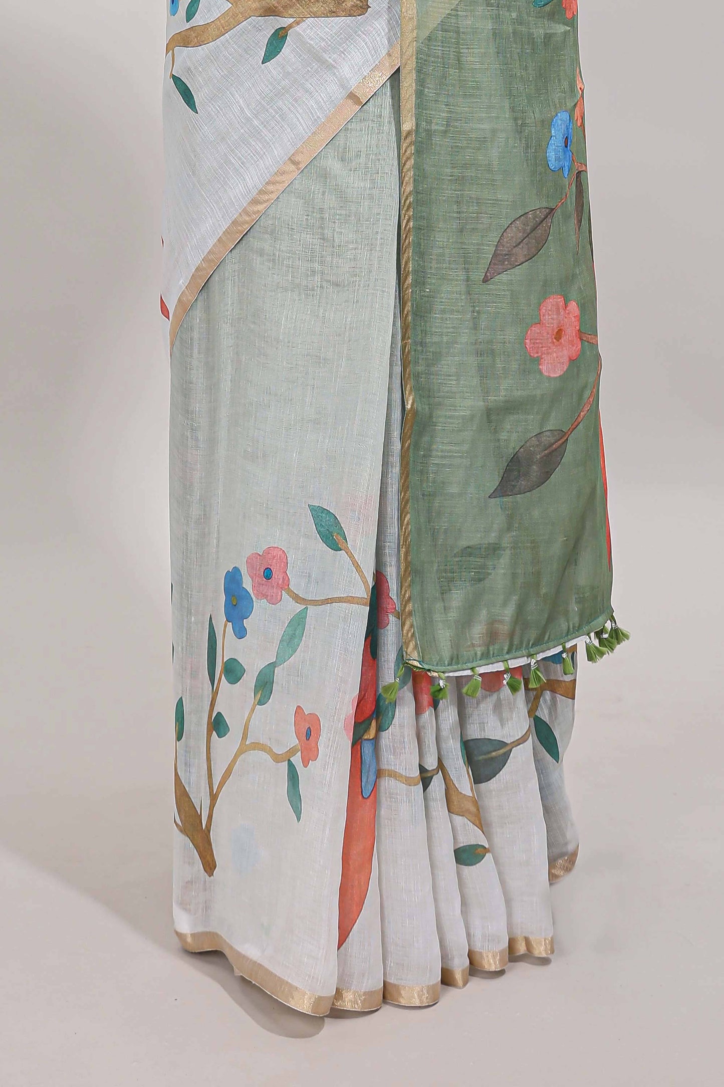 Green floral vines linen cotton saree with self zari border and matching blouse