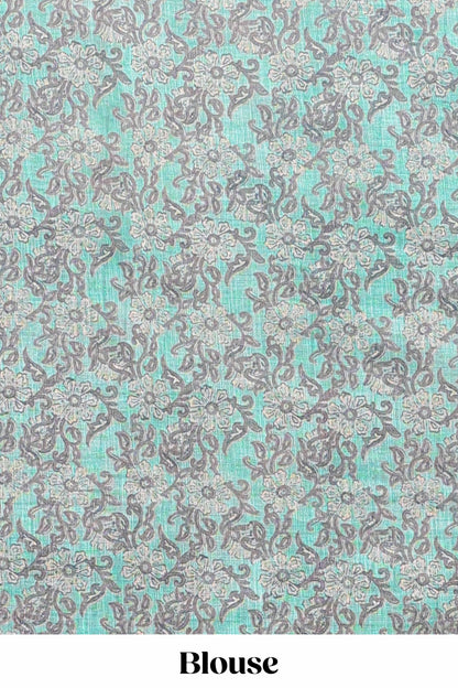 Beige linen cotton saree with green shibori print, self zari border and floral design pallu