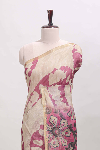 Beige linen cotton saree with purple shibori print, self zari border and floral design pallu