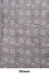 Beige linen cotton saree with grey shibori print, self zari border and floral design pallu