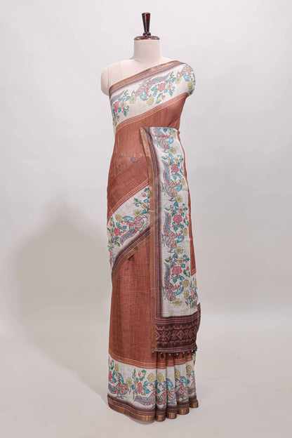 Brown checked linen cotton saree with bottom floral and birds design, self zari border and printed blouse