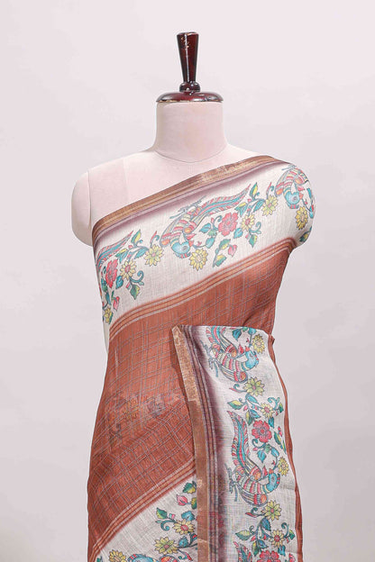 Brown checked linen cotton saree with bottom floral and birds design, self zari border and printed blouse