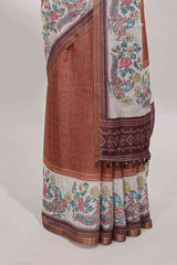 Brown checked linen cotton saree with bottom floral and birds design, self zari border and printed blouse
