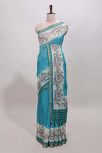 Turquoise green checked linen cotton saree with bottom floral and birds design, self zari border and printed blouse