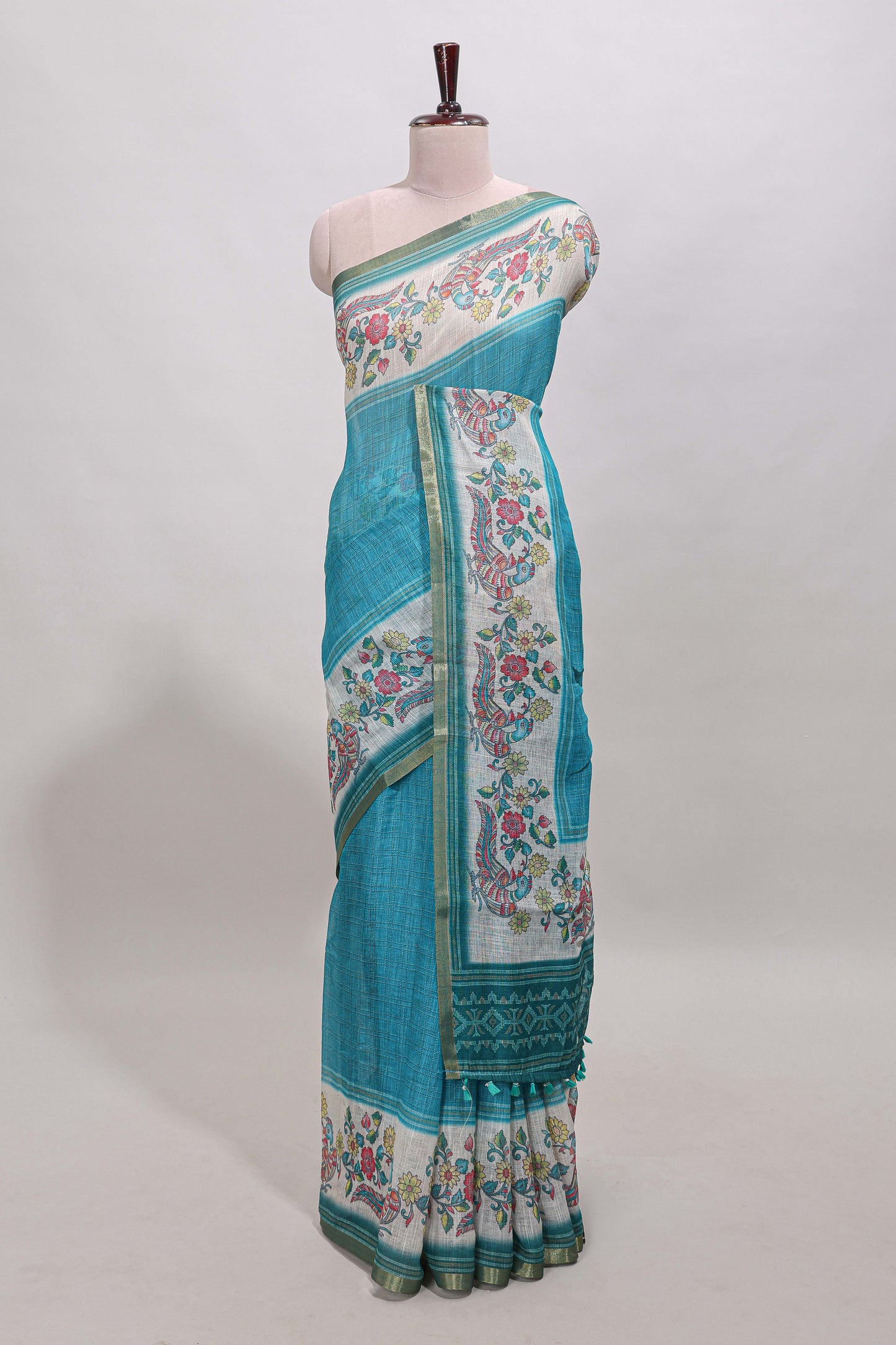 Turquoise green checked linen cotton saree with bottom floral and birds design, self zari border and printed blouse