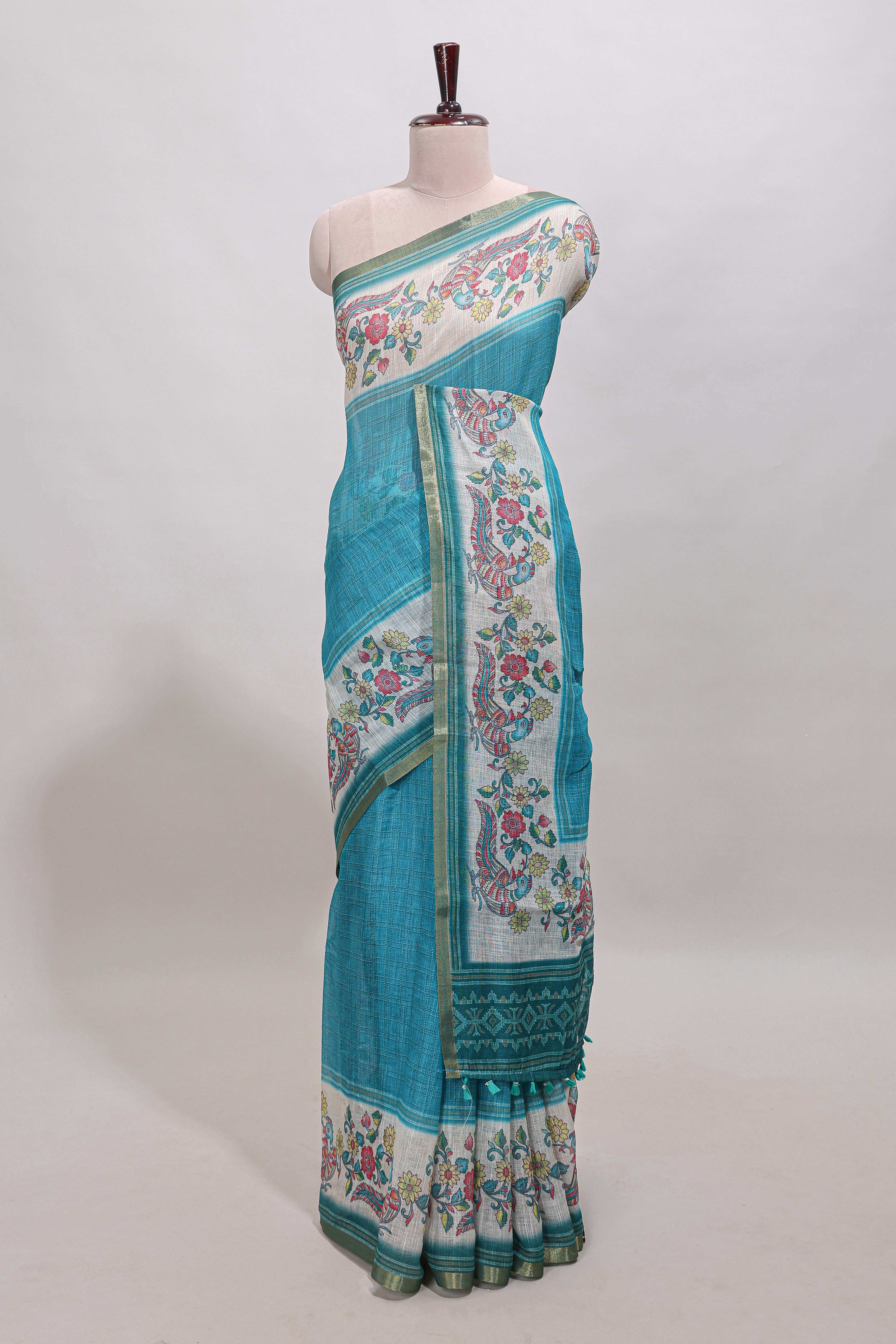 Turquoise green checked linen cotton saree with bottom floral and birds design, self zari border and printed blouse