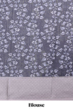 Black floral and peacock design linen cotton saree with contrast border and printed blouse
