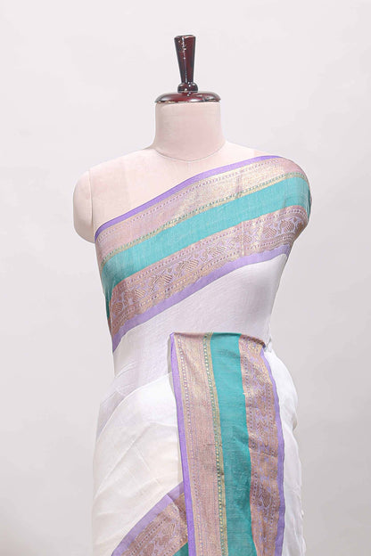 White plain linen cotton saree with contrast zari bentex border & matching pallu with tassels