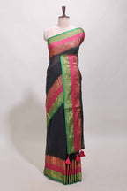 Black plain linen cotton saree with contrast zari bentex border & matching pallu with tassels