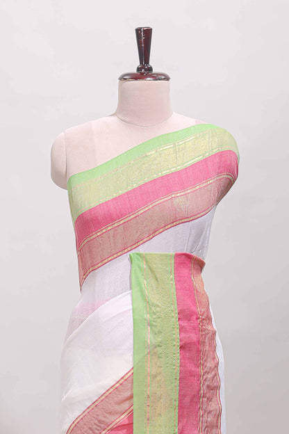 White plain linen cotton saree with contrast zari bentex border & matching pallu with tassels