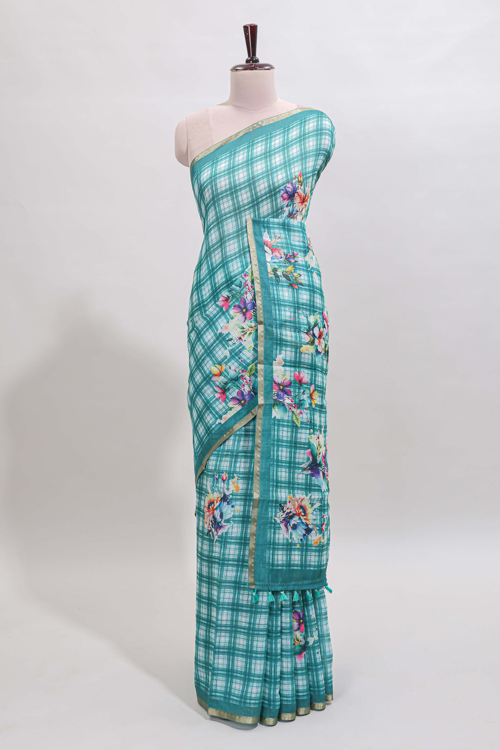 Teal green checked floral motifs linen cotton saree with self zari border matching blouse