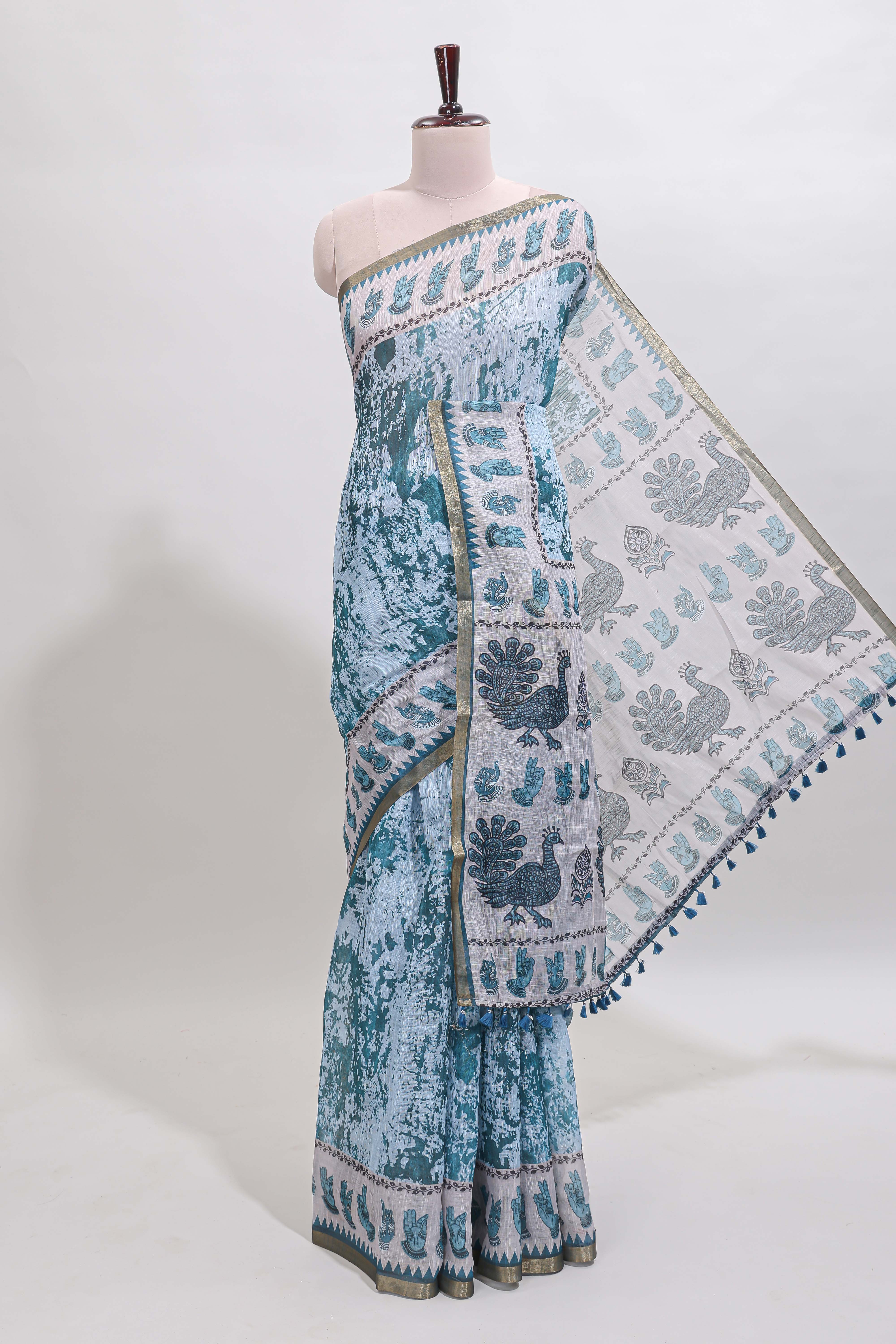 Turquoise blue shibori style classical dance muthirai design linen cotton saree with contrast border and blouse