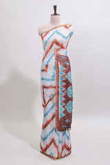Off white chevron style shibori print linen cotton saree with contrast brown border and ikkat design pallu