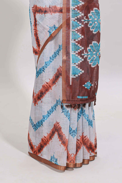 Off white chevron style shibori print linen cotton saree with contrast brown border and ikkat design pallu