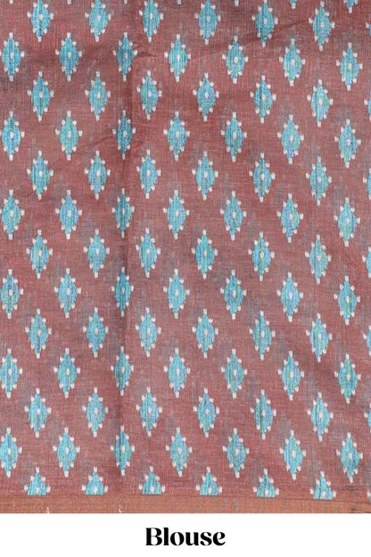 Off white chevron style shibori print linen cotton saree with contrast brown border and ikkat design pallu