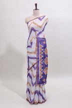Off white chevron style shibori print linen cotton saree with contrast violet border and ikkat design pallu