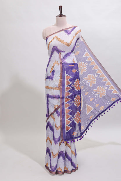 Off white chevron style shibori print linen cotton saree with contrast violet border and ikkat design pallu