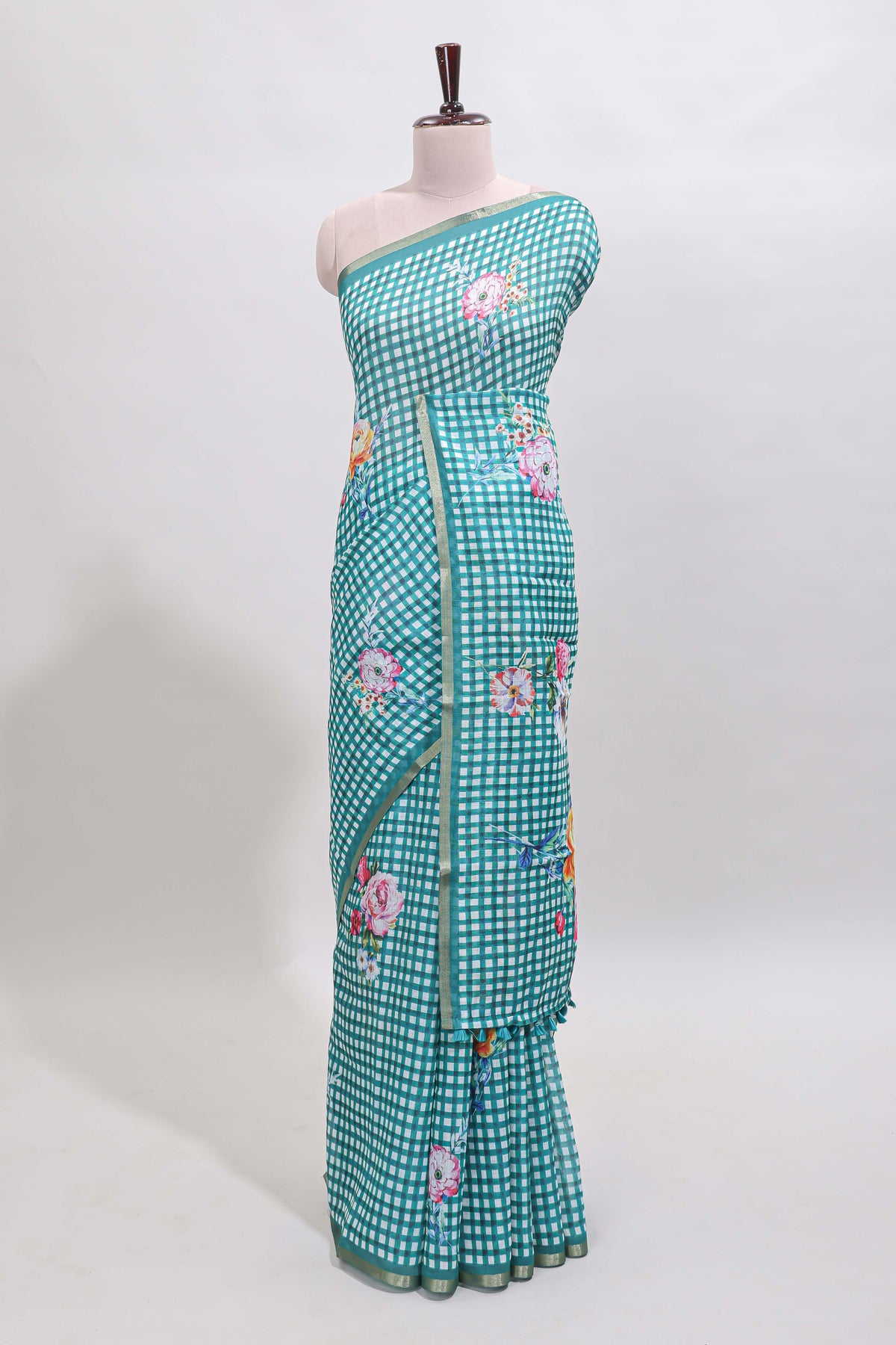 Green checked floral design linen cotton saree with self zari border and printed blouse