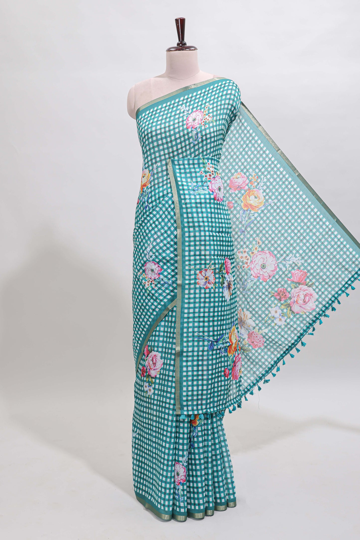 Green checked floral design linen cotton saree with self zari border and printed blouse