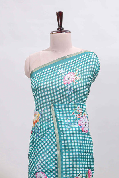 Green checked floral design linen cotton saree with self zari border and printed blouse