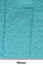 Green checked floral design linen cotton saree with self zari border and printed blouse