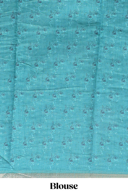 Green checked floral design linen cotton saree with self zari border and printed blouse