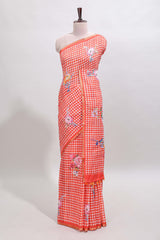 Orange checked floral design linen cotton saree with self zari border and printed blouse