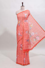 Orange checked floral design linen cotton saree with self zari border and printed blouse