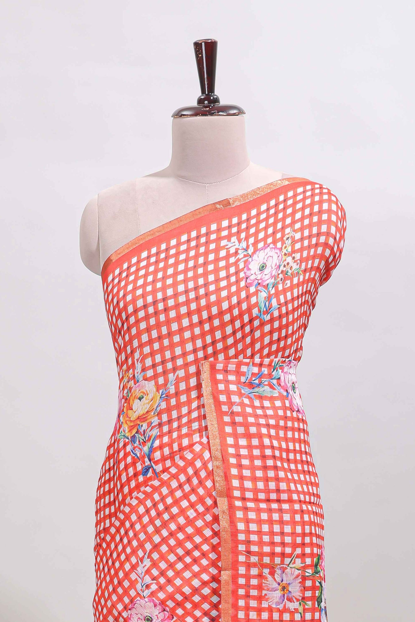 Orange checked floral design linen cotton saree with self zari border and printed blouse