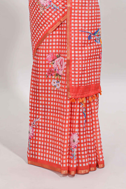 Orange checked floral design linen cotton saree with self zari border and printed blouse