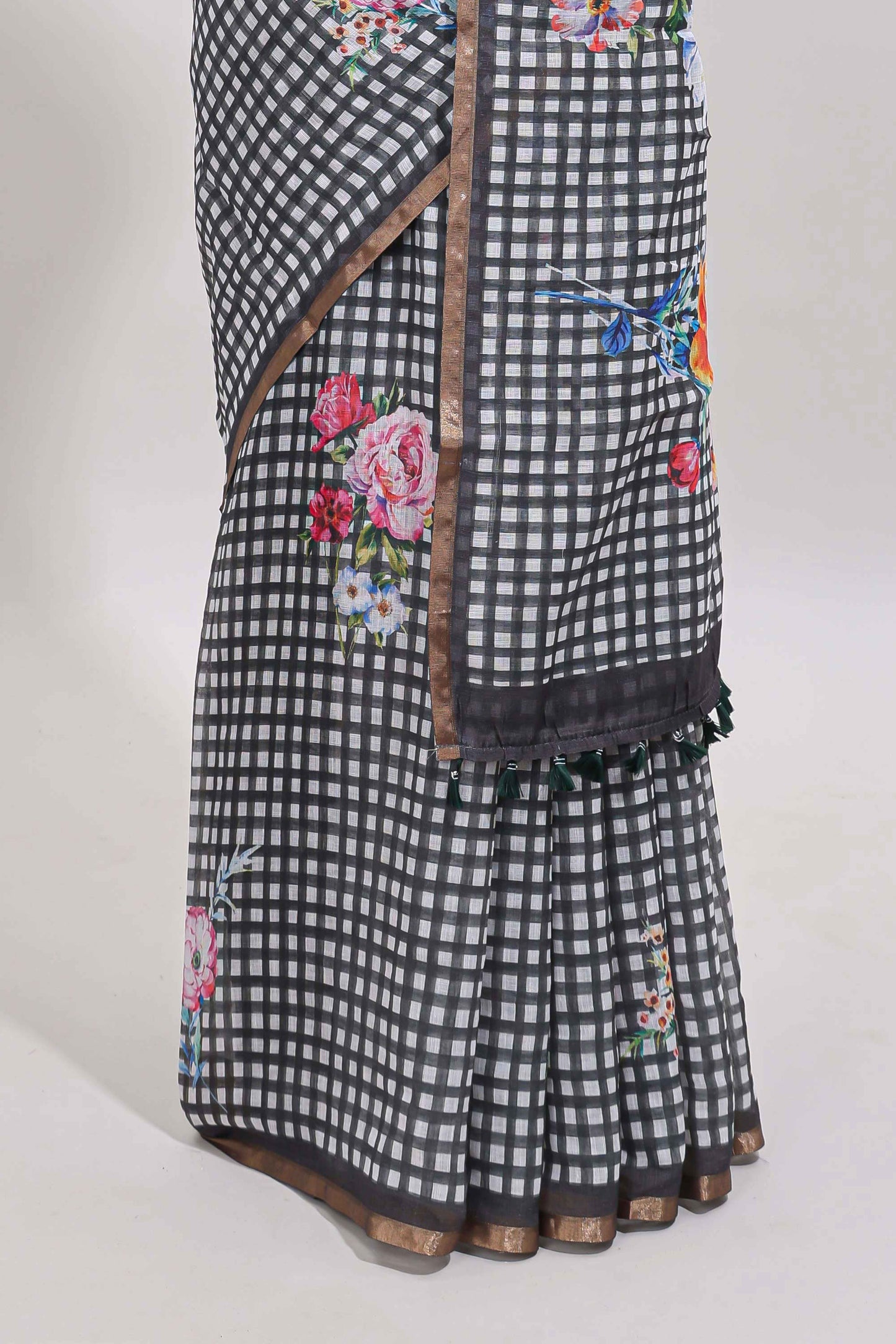 Grey checked floral design linen cotton saree with self zari border and printed blouse