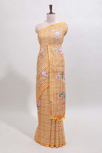 Mustard checked floral design linen cotton saree with self zari border and printed blouse
