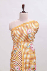 Mustard checked floral design linen cotton saree with self zari border and printed blouse