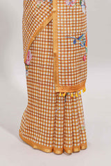 Mustard checked floral design linen cotton saree with self zari border and printed blouse