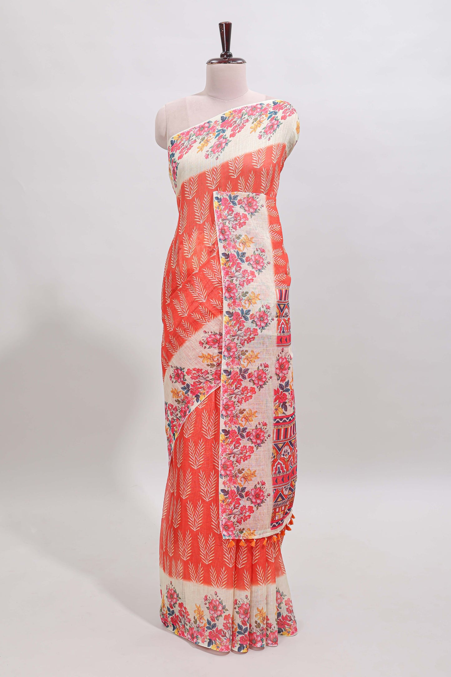 Orange leaf print linen cotton saree with contrast floral design border and matching blouse