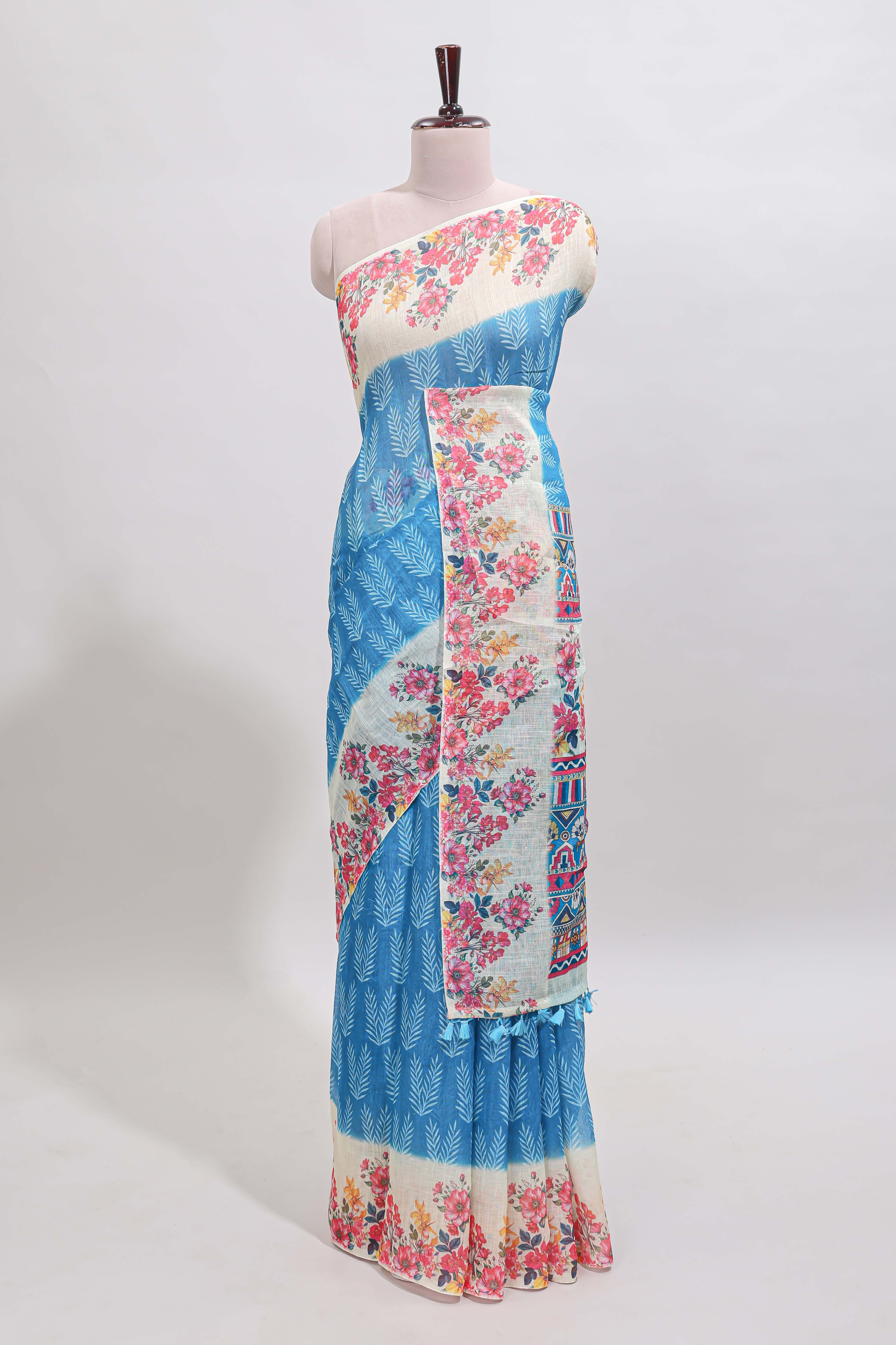 Blue leaf print linen cotton saree with contrast floral design border and matching blouse