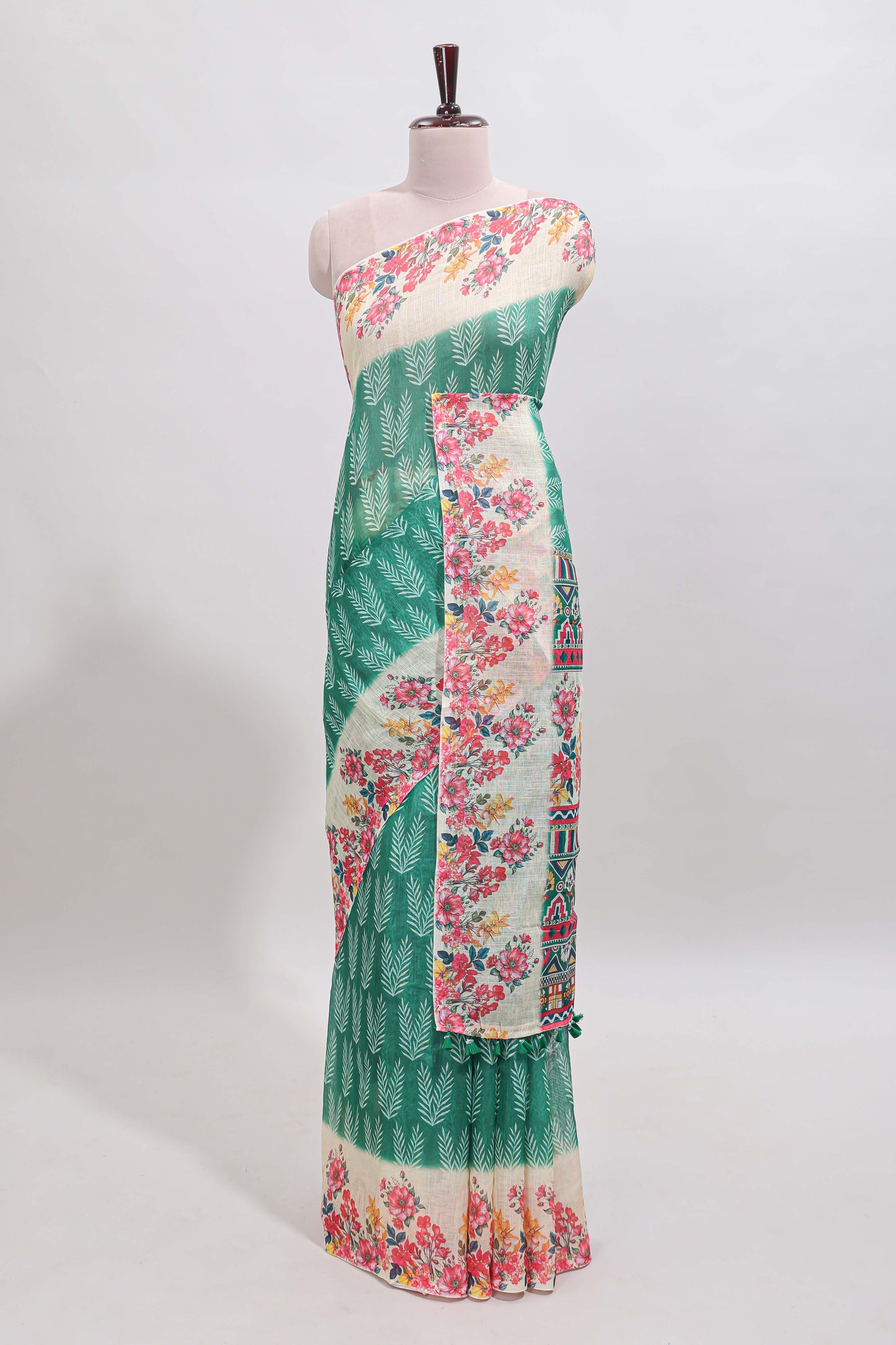 Green leaf print linen cotton saree with contrast floral design border and matching blouse