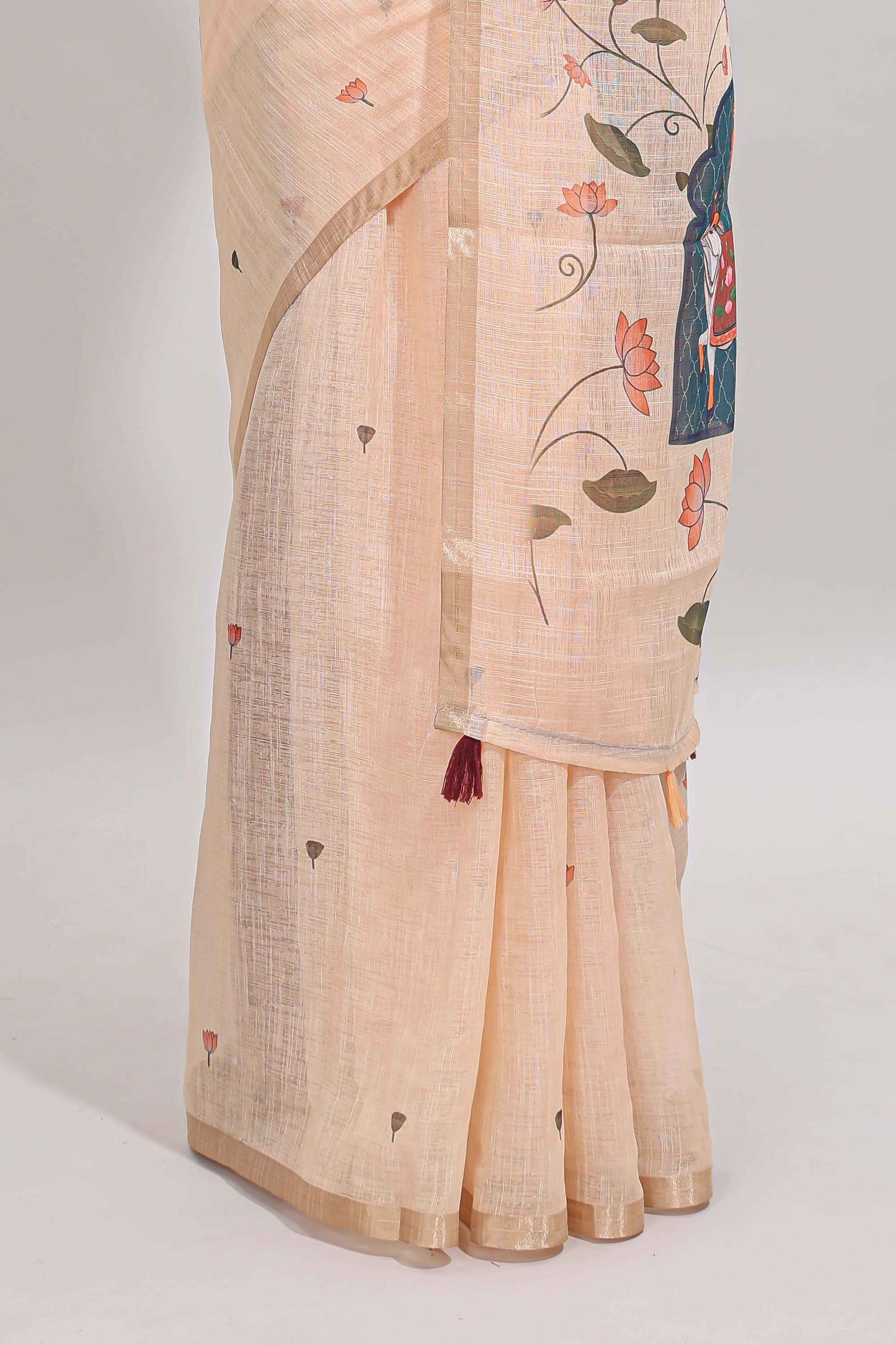 Cream floral design linen cotton saree with self zari border, matching pallu and contrast blouse