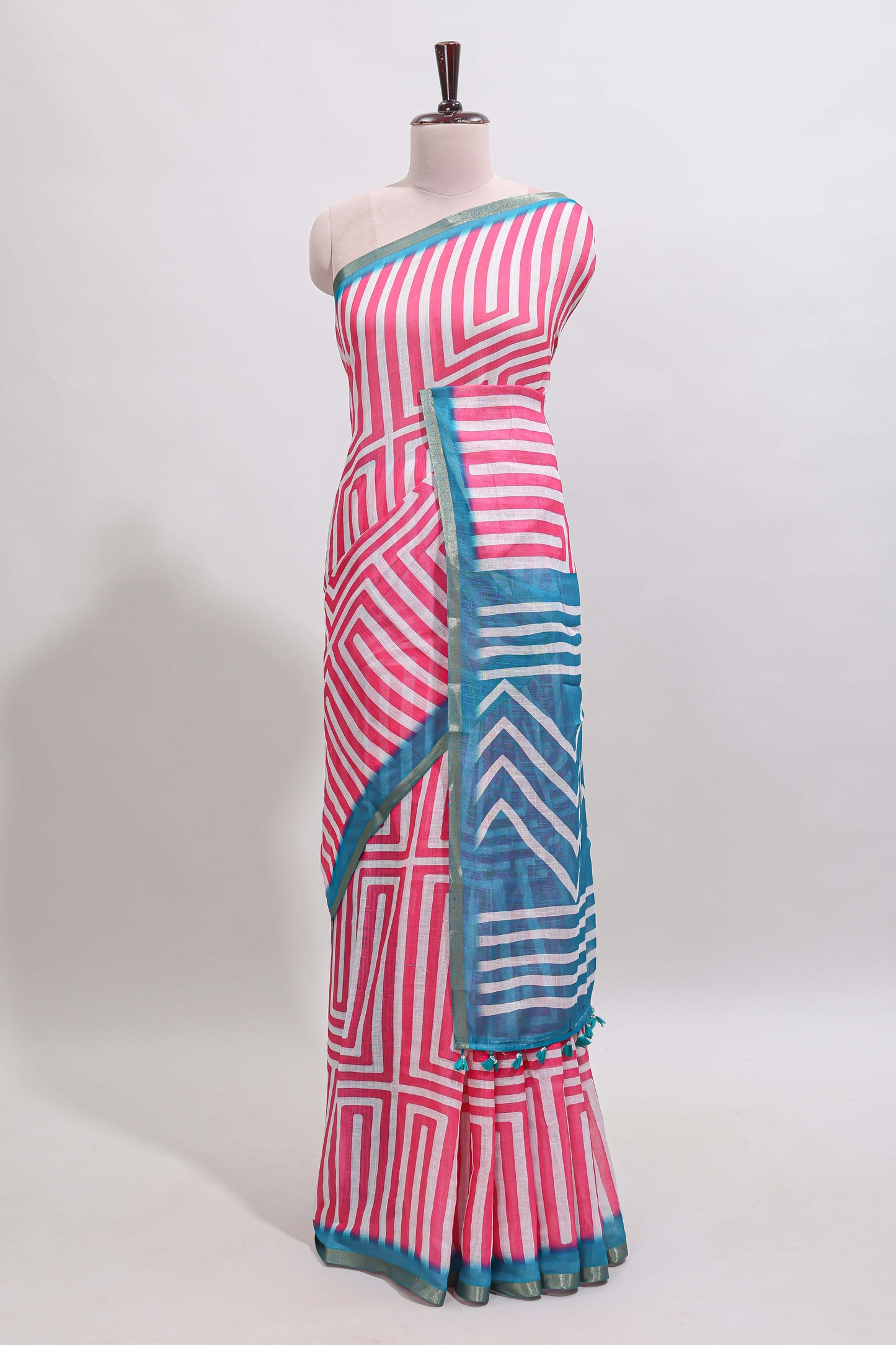 Pink geometric design linen cotton saree with contrast zari border and pallu