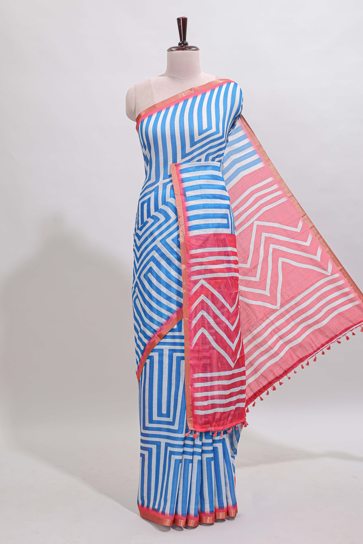 Sky blue geometric design linen cotton saree with contrast zari border and pallu