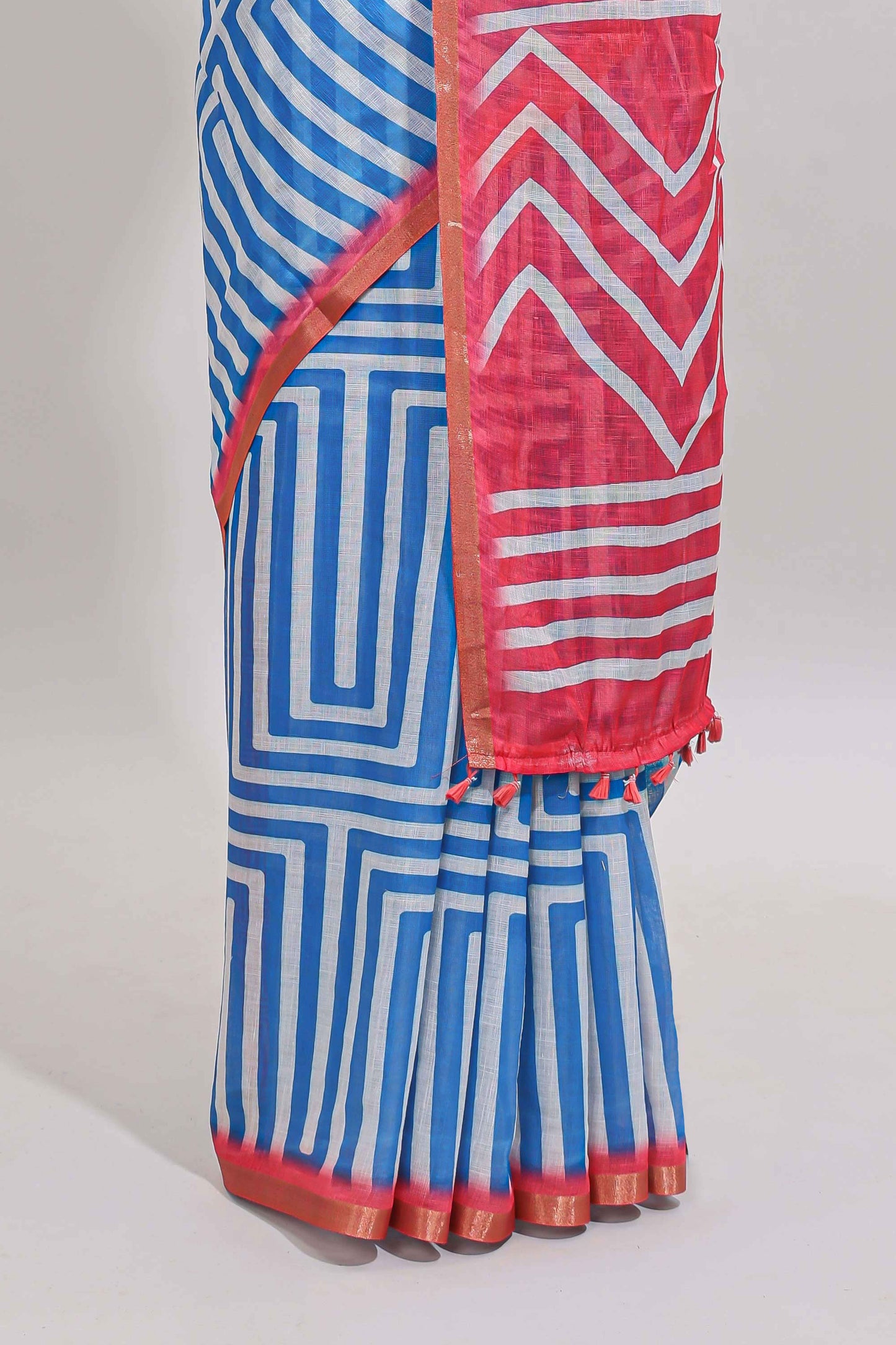 Sky blue geometric design linen cotton saree with contrast zari border and pallu