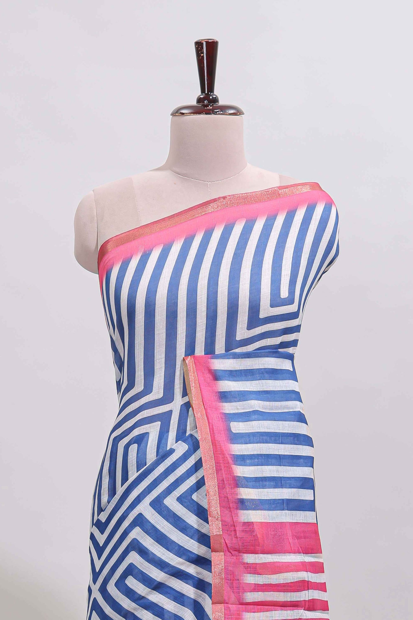 Blue geometric design linen cotton saree with contrast zari border and pallu