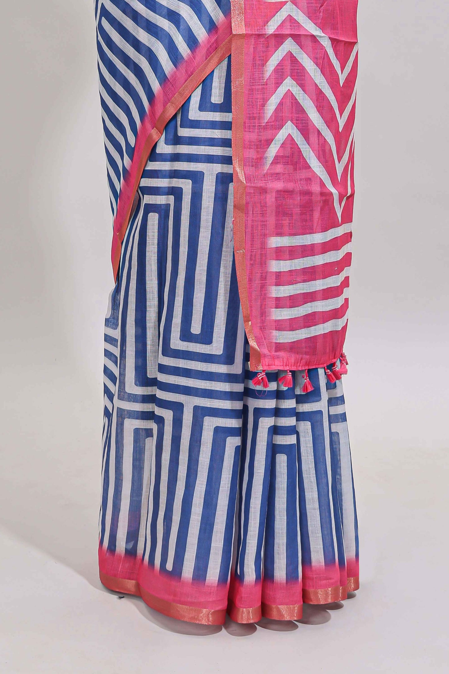 Blue geometric design linen cotton saree with contrast zari border and pallu