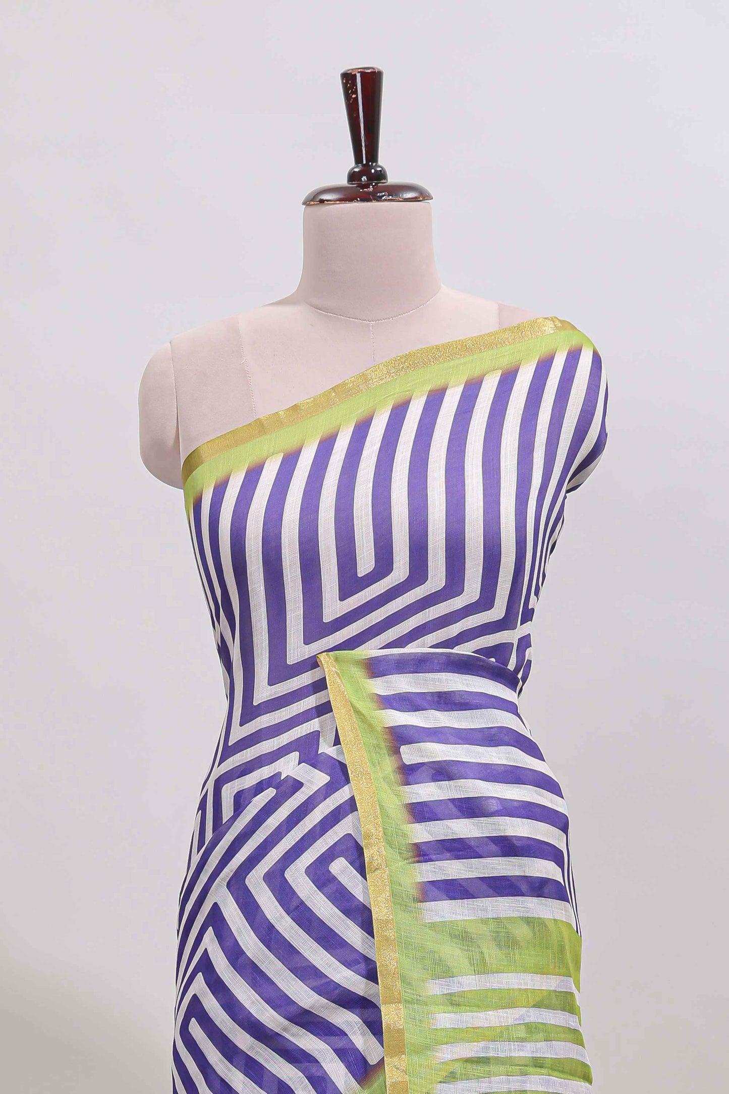 Violet geometric design linen cotton saree with contrast zari border and pallu