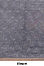 Grey checked floral design linen cotton saree with self zari border and matching blouse