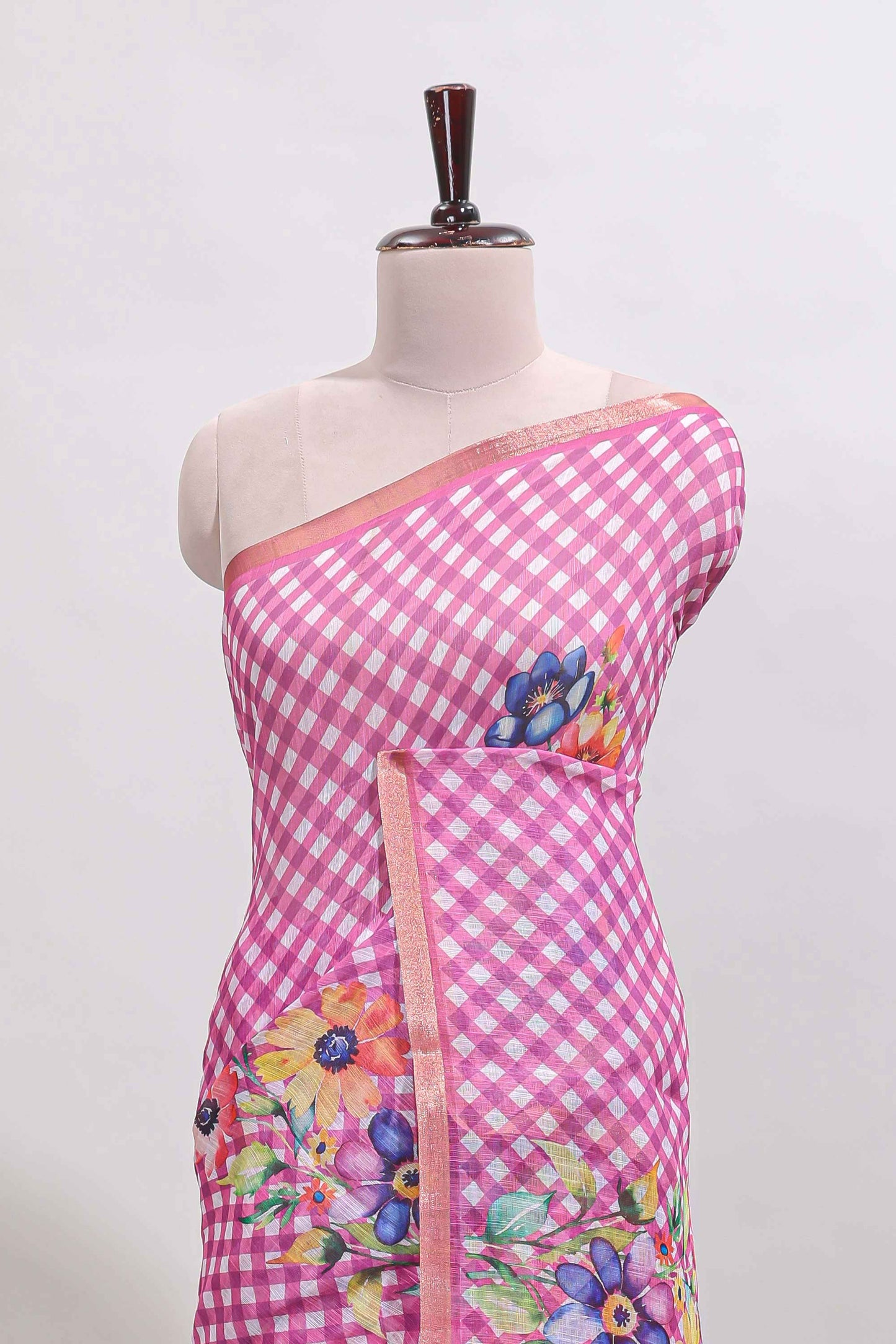 Pink checked floral design linen cotton saree with self zari border and matching blouse